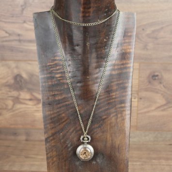 Small pocket watch with tinted glass lid